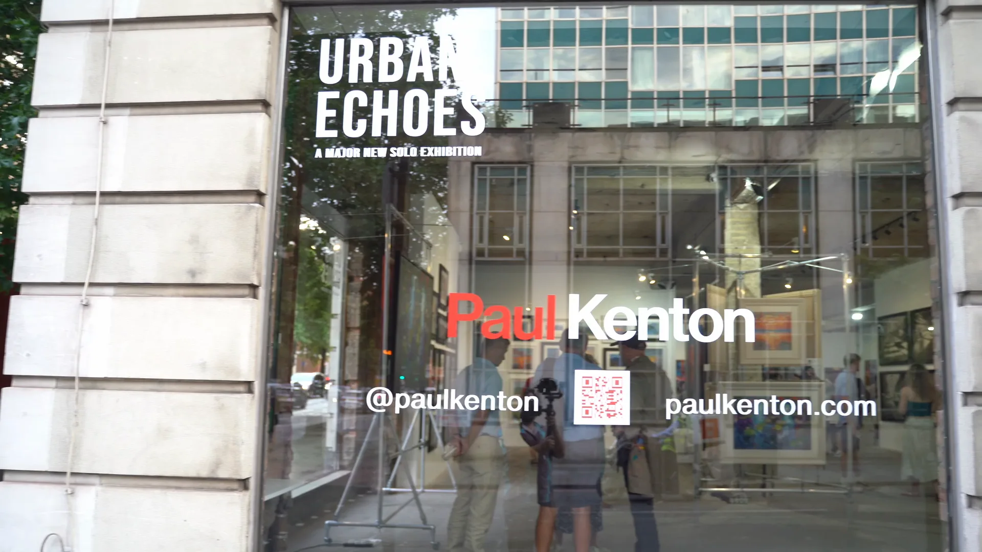 The Urban Echoes window on Marylebone Road: the show’s name in white lettering over a large painting of a London street